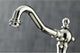 Kingston Brass Widespread Bathroom Faucet With Brass Pop-Up, Polished Nickel