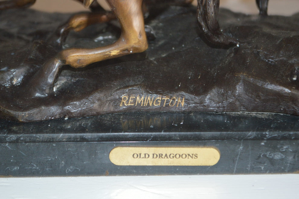 Old Dragon by Remington replica Bronze Statue -  Size: 32"L x 12"W x 13"H.