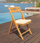 9-Piece Outdoor Teak Dining Set: 72" Round Table, 8 Surf Folding Arm Chairs