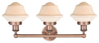 Oxford 3-Light 25" Bath Vanity Light, Antique Copper Finish, Matte White Shade