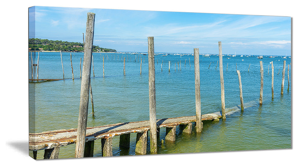 "Wooden Piers by Blue Sea" Canvas Print