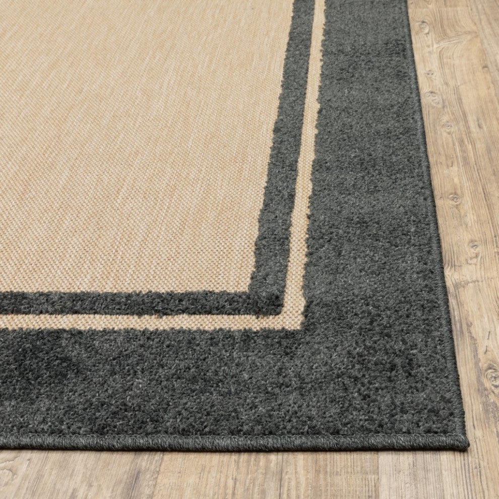 HomeRoots 9' x 12' Sand and Black Border Indoor Outdoor Area Rug
