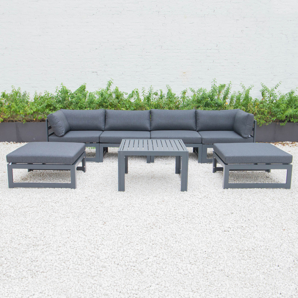LeisureMod Chelsea 7-Piece Patio Ottoman Sectional With Coffee Table, Black