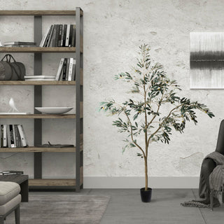 Product shown in a real living room environment; full tree visible for scale and context.