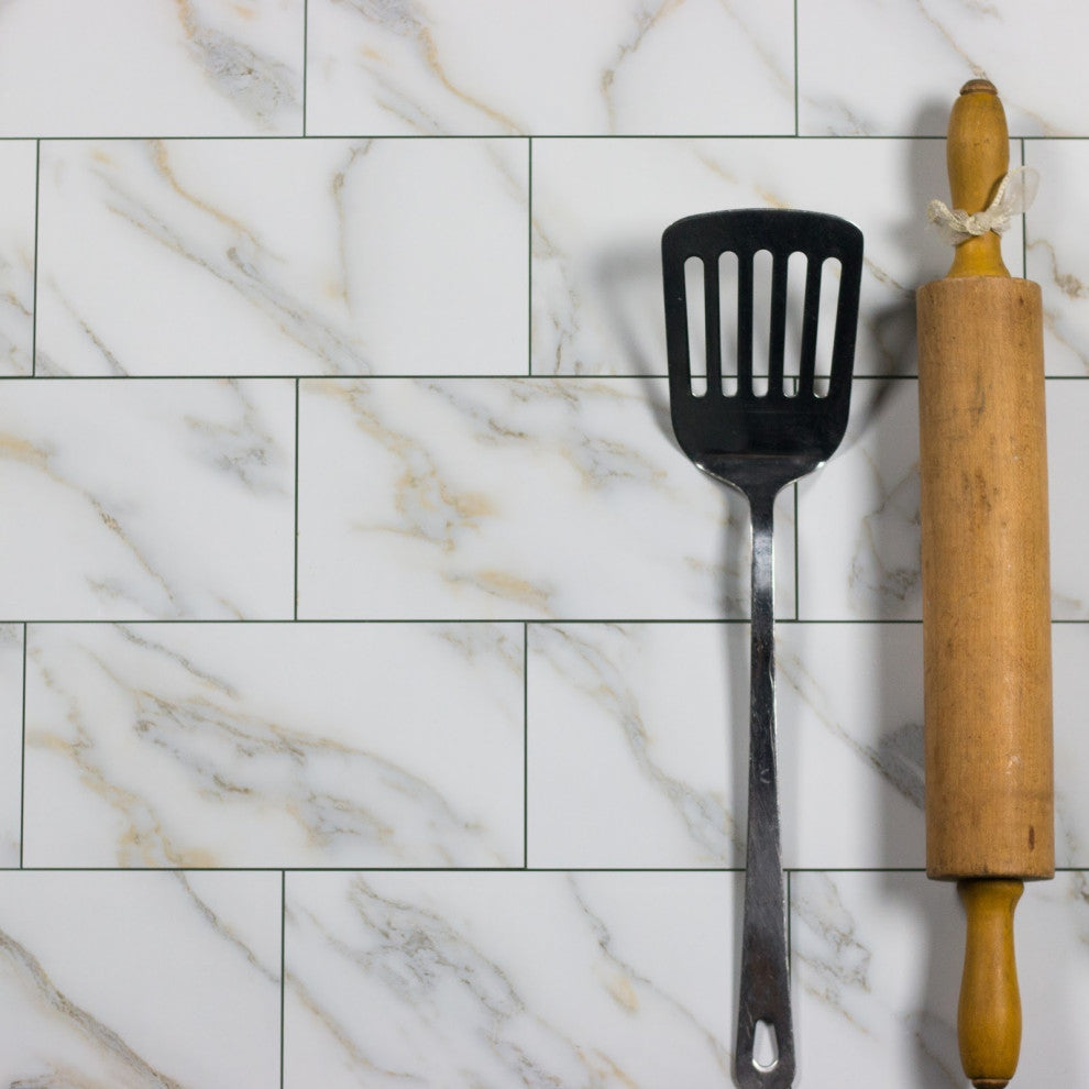 Nature 4 in x 8 in Glass Subway Tile in Calacatta Gold