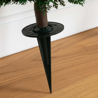 Close-up of stake/assembly; not showing full product.