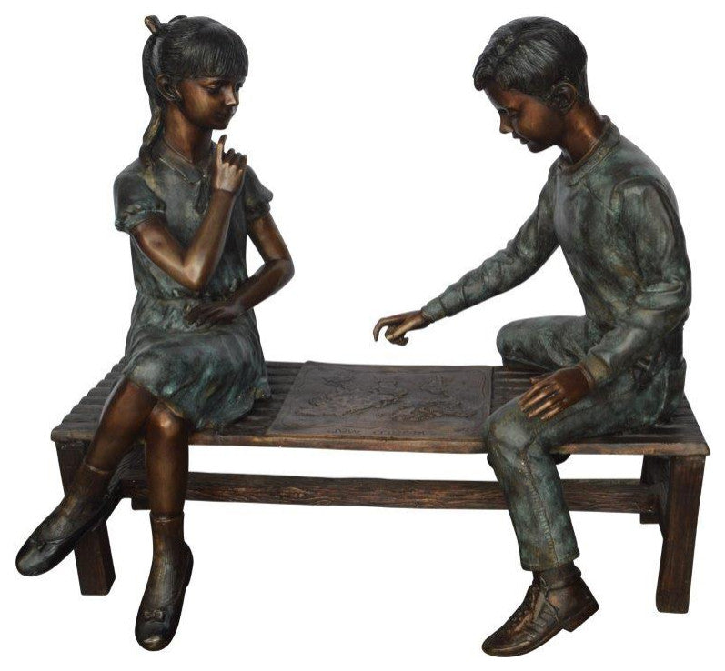 Young Couple Reviewing a World Map Bronze Statue -  Size: 32"L x 47"W x 42"H.