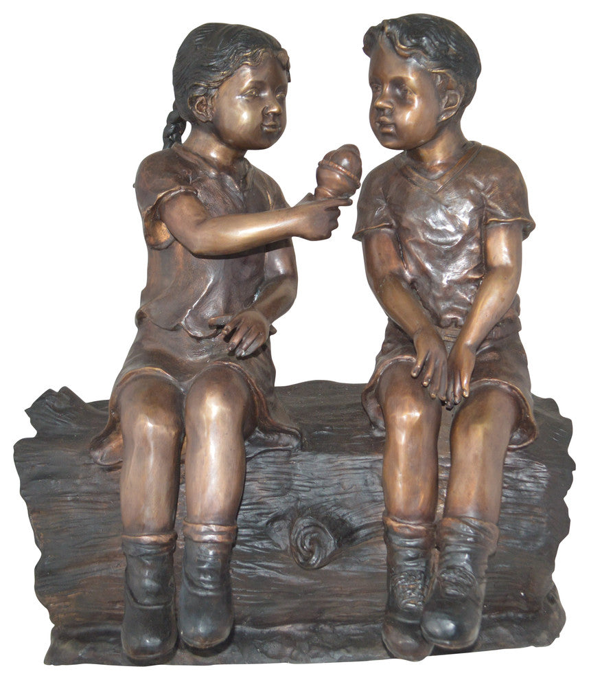 Boy and Girl enjoying an ice-cream bronze statue -  Size: 28"L x 24"W x 33"H.