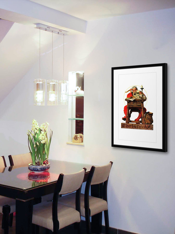 "Santa at His Desk" Framed Art Print by Norman Rockwell