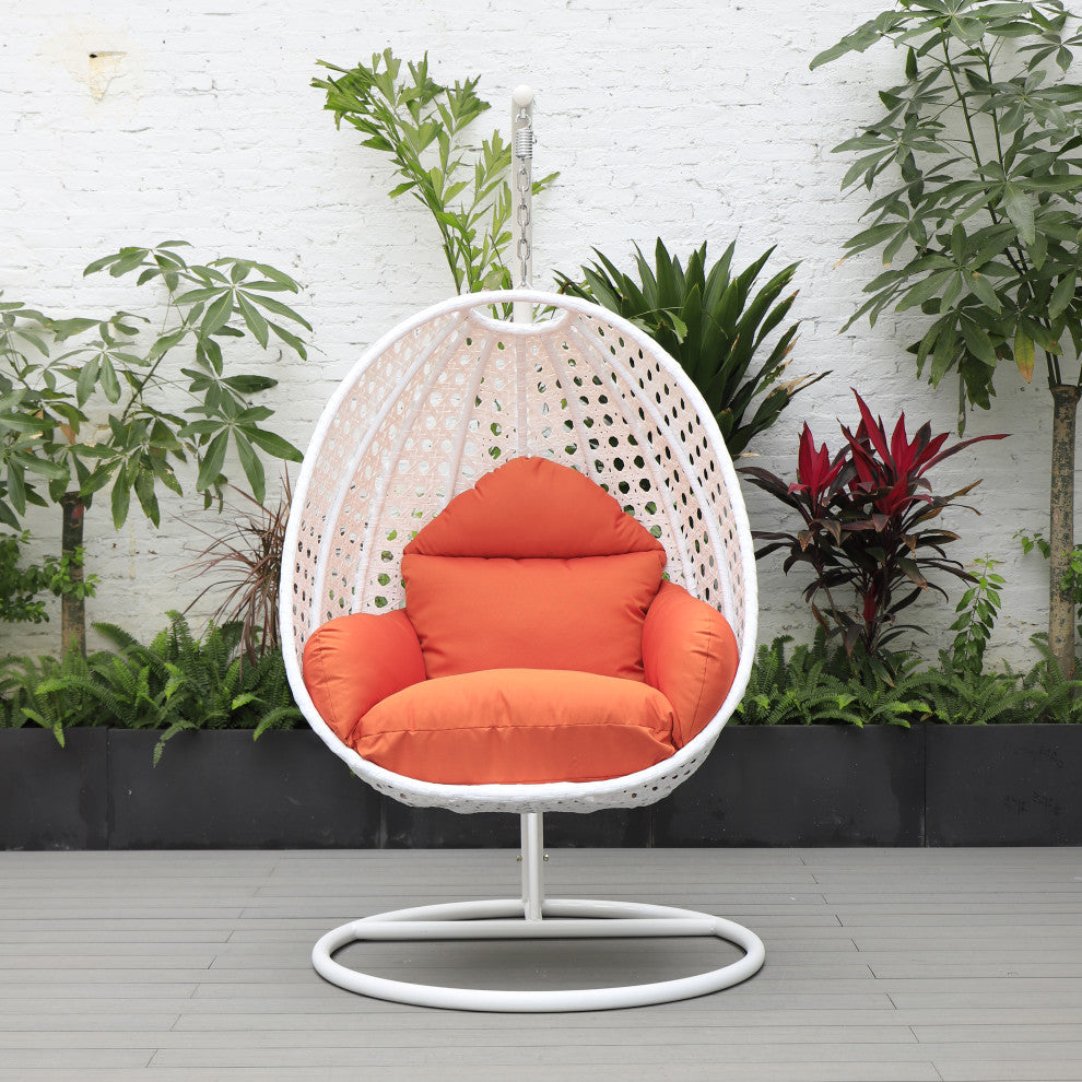 LeisureMod White Wicker Hanging Egg Chair With Stand and Cushion, Orange