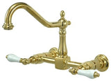 Kingston Brass Two-Handle Wall Mount Bridge Kitchen Faucet, Polished Brass