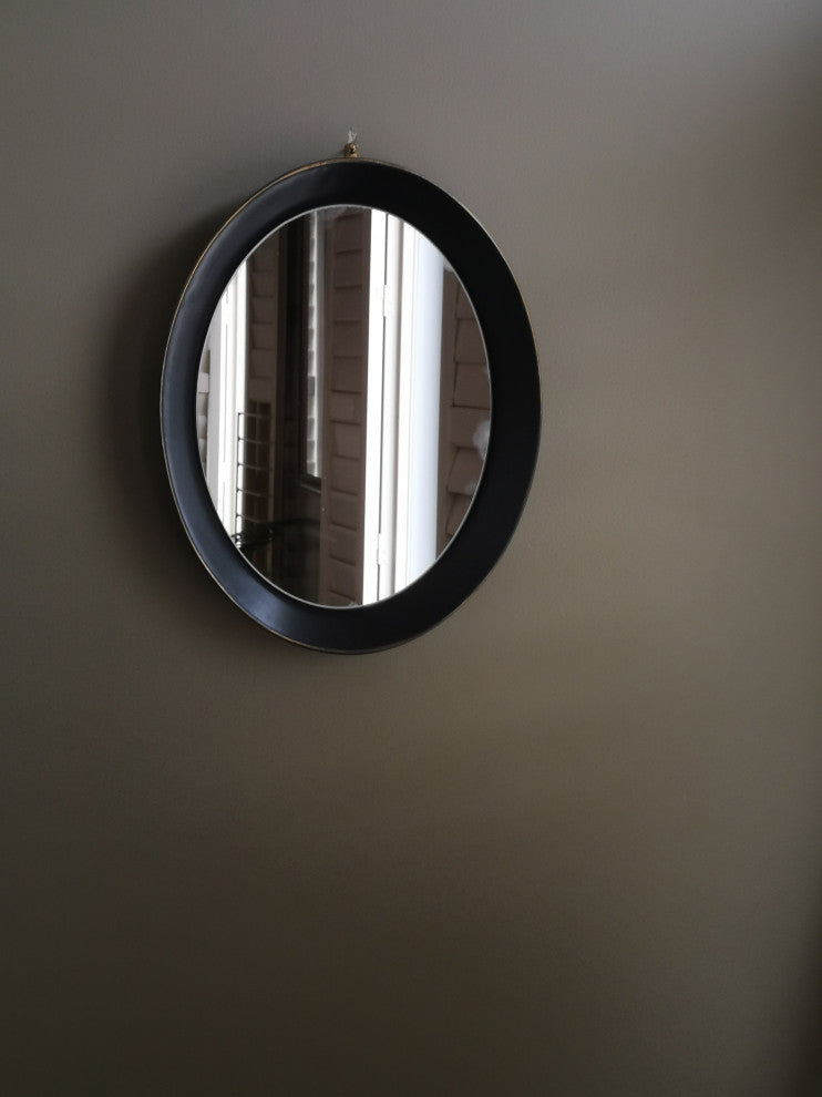 Oval metal decorative mirror