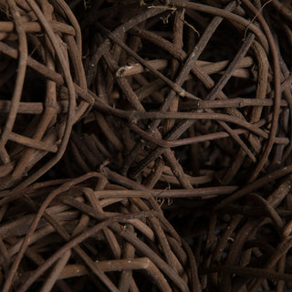 Macro close-up of wicker material; detail shot with dark background.