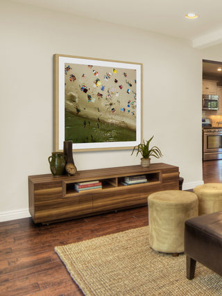 "Beach Goers" Framed Print by Karolis Janulis