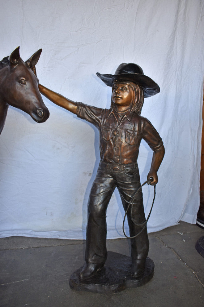 A Young Cowgirl With A Young Horse Bronze Statue Size: 60" x 30" x 44"H