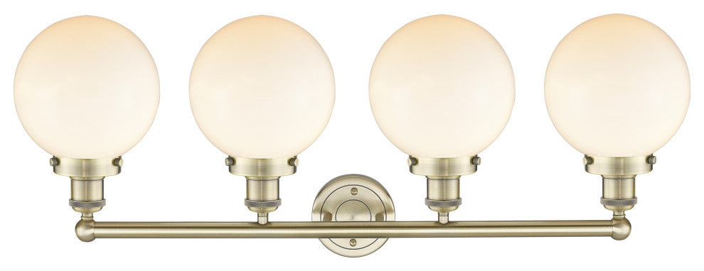 Large Beacon 4-Light 34" Vanity Light, Antique Brass Finish, Matte White Shade