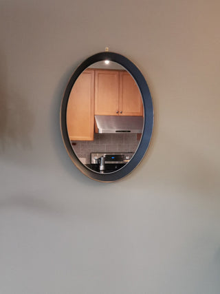 Oval metal decorative mirror