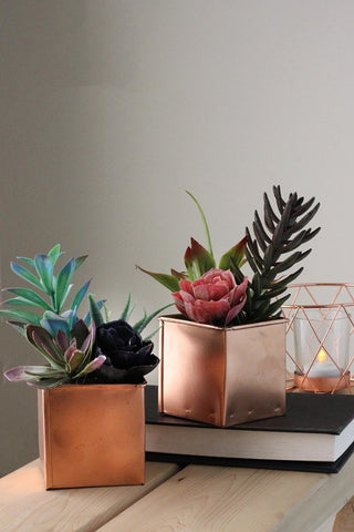 Another lifestyle shot showing the product in a real setting (on a desk with decor).