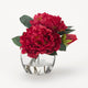 Beauty peonies in glass cube