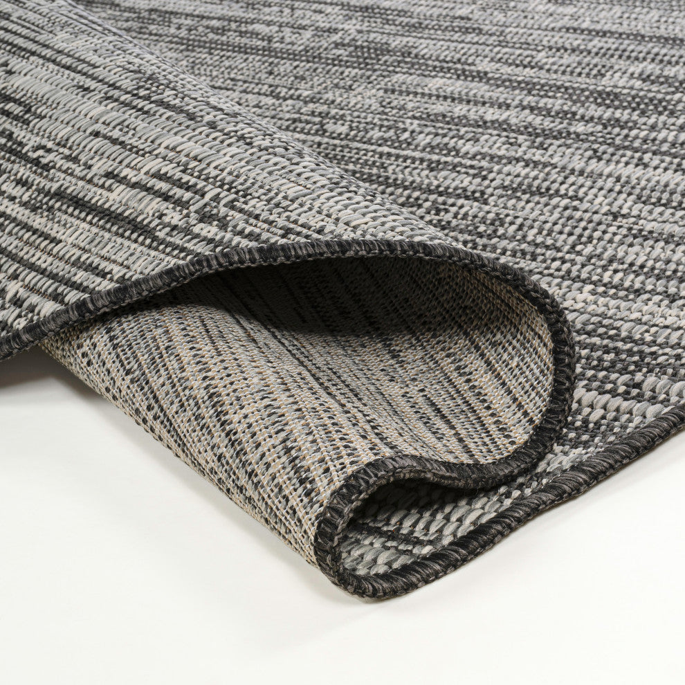 Callan Modern Rustic Abstract Indoor/Outdoor Shaped Area Rug