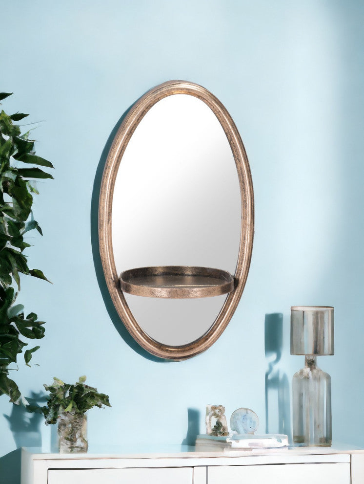 Antiqued Gold Oval Mirror With Petite Shelf