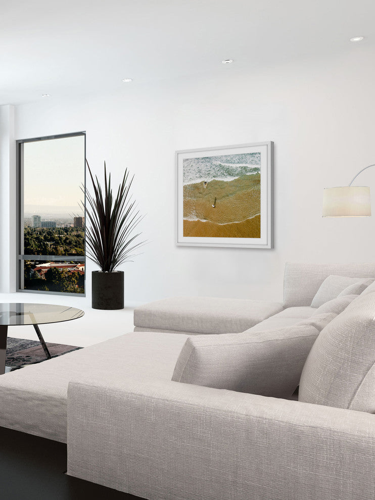 "In The Tide" Framed Print by Karolis Janulis