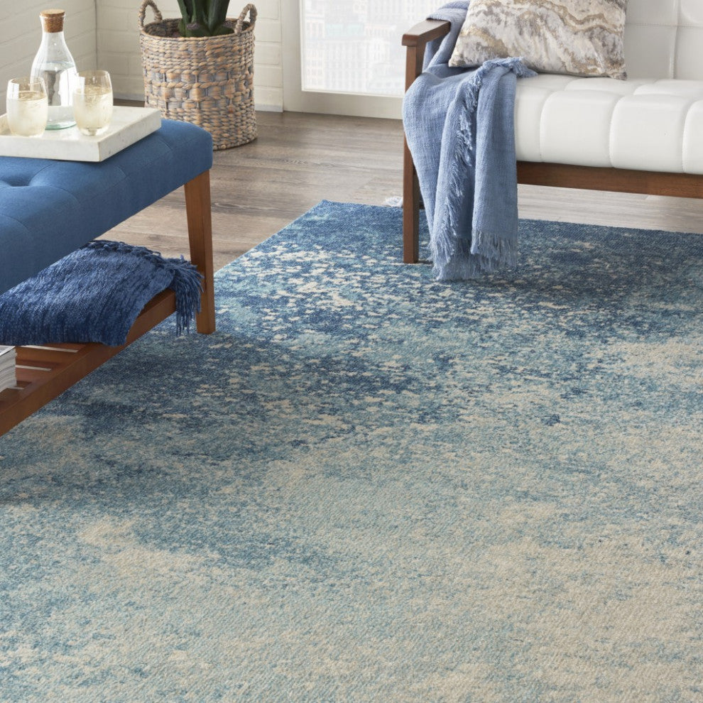 7' X 10' Ivory And Blue Abstract Power Loom Area Rug
