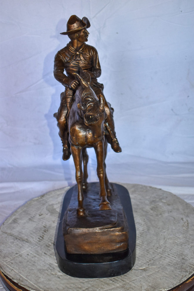 Cowboy Remington Replica Bronze Statue on Triple Marble Size: 25" x 8" x 24"H