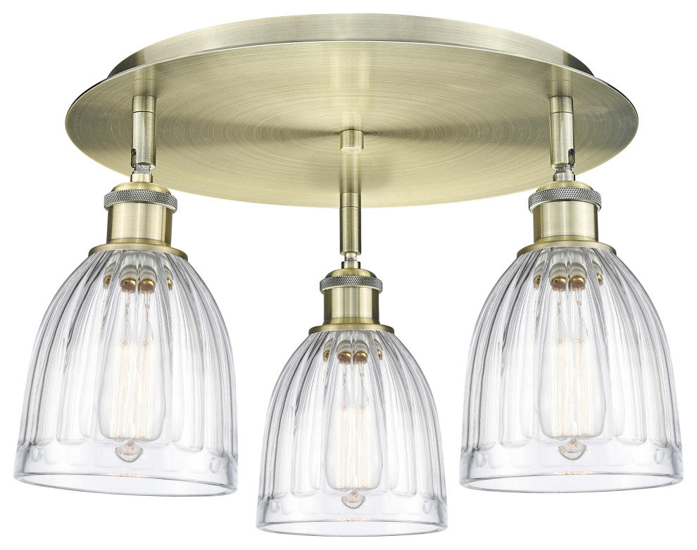 Brookfield-3 Light 18" Flush Mount-Antique Brass, Clear Glass Shade
