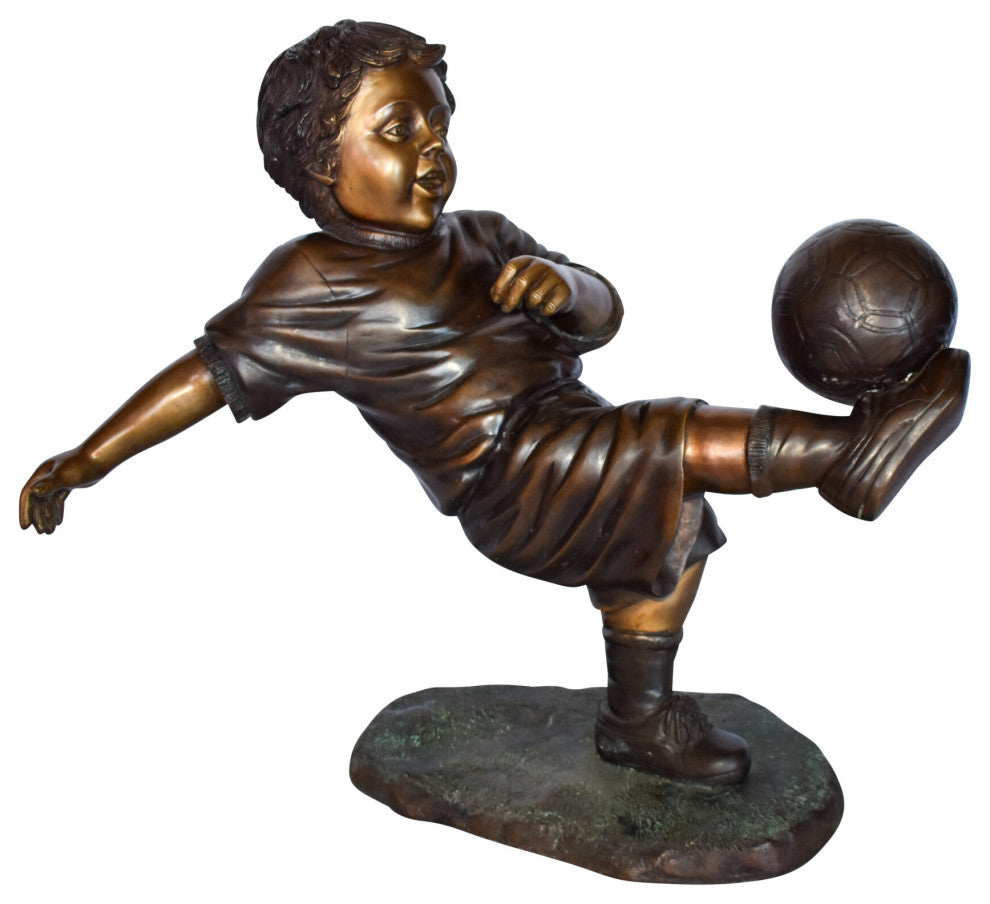 Young Boy Passionately Kicking Soccer Ball Bronze Statue  Size: 26" x 16" x 24