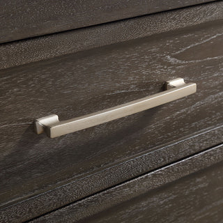 Close-up side/edge view of drawer handle on white background; cropped feature shot.