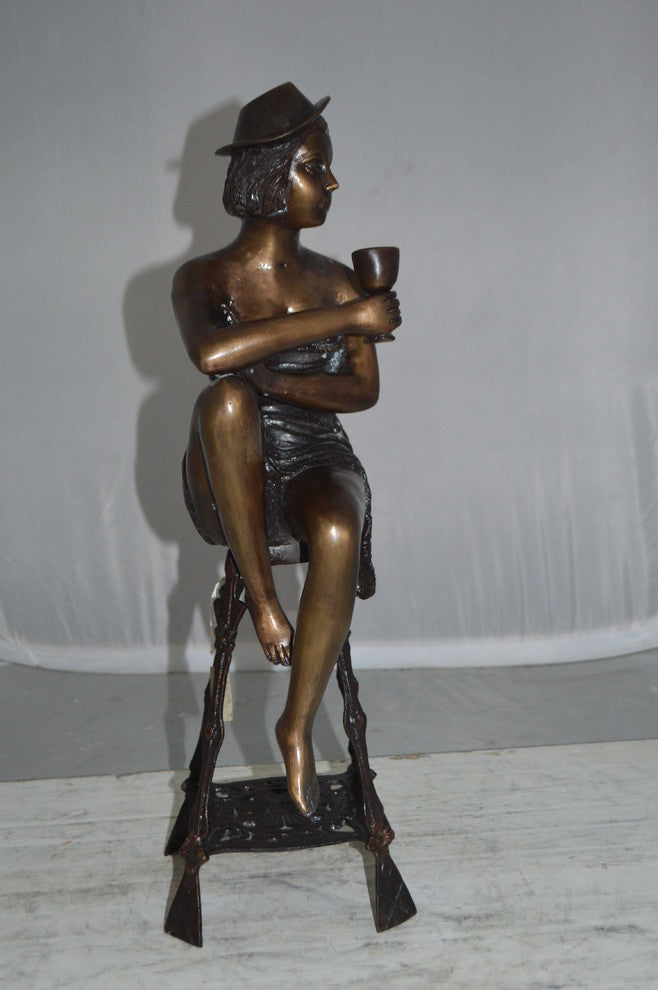 Lady W Champagne Glass Bronze Statue - Size: 8"L x 6"W x 22"H.