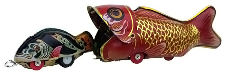 Collectible Tin Fish-Eating Whale Toy