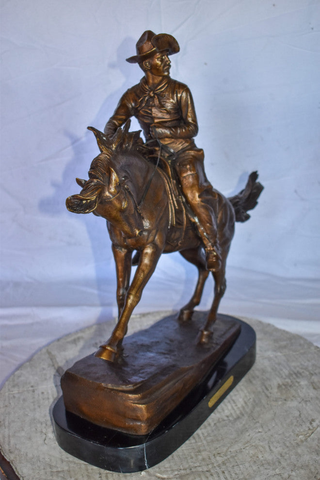 Cowboy Remington Replica Bronze Statue on Triple Marble Size: 25" x 8" x 24"H